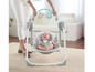 Dítě v houpací židli Fisher-Price.