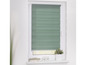 Zelená roleta na okně