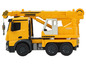 Žlutý jeřáb Liebherr s otočným ramenem.