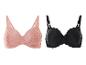 Růžové a černé podprsenky, krajka a hladká látka.
