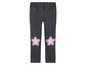Šedé kalhoty s růžovými hvězdami na kolenou
