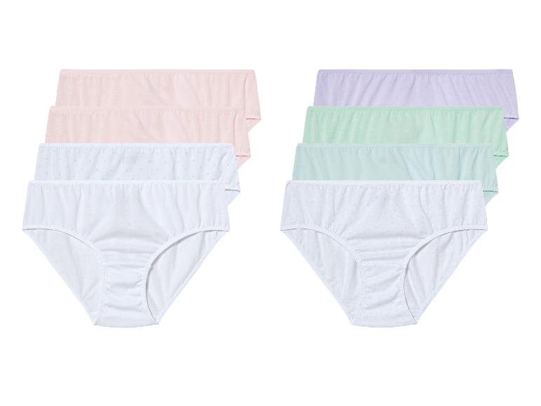 Dvě sady spodního prádla s bílými, růžovými a zelenými kalhotkami.