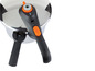 Tefal tlakový hrnec s černou rukojetí a oranžovými detaily.