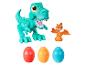 Zelený Tyrannosaurus Rex, oranžový Pterodactyl a tři Play-Doh vajíčka.