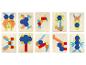 Sada dřevěných geometrických puzzle s různými vzory zvířat a objektů.