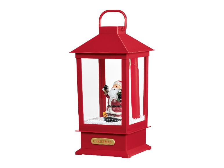 Červená vánoční lucerna se Santa Clausem a sněhem