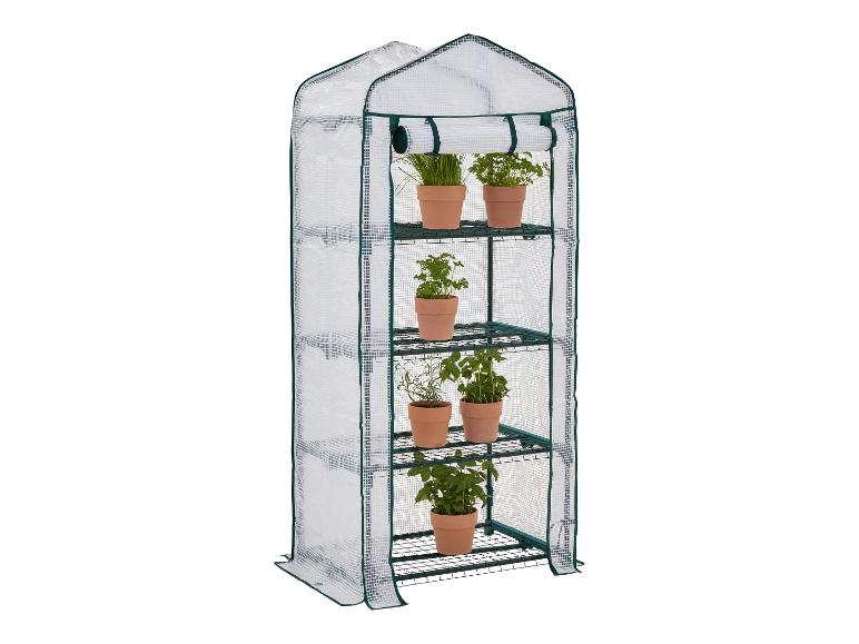 Vertikální zahradní skleník se 4 policemi a rostlinami v terakotových květináčích.