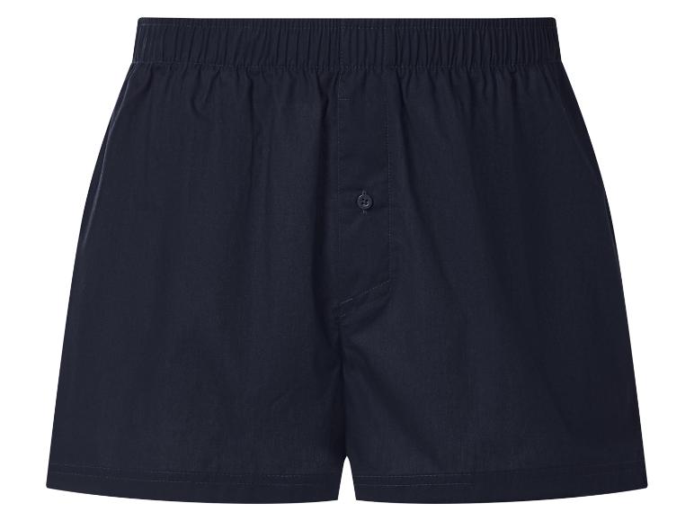 Tmavě modré pánské boxerky s elastickým pasem a zapínáním na knoflíky.