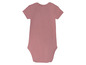 Růžový overal s krátkým rukávem pro miminko.
