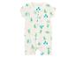 Bílý overal pro miminko s krátkým rukávem a motivem dinosaurů.