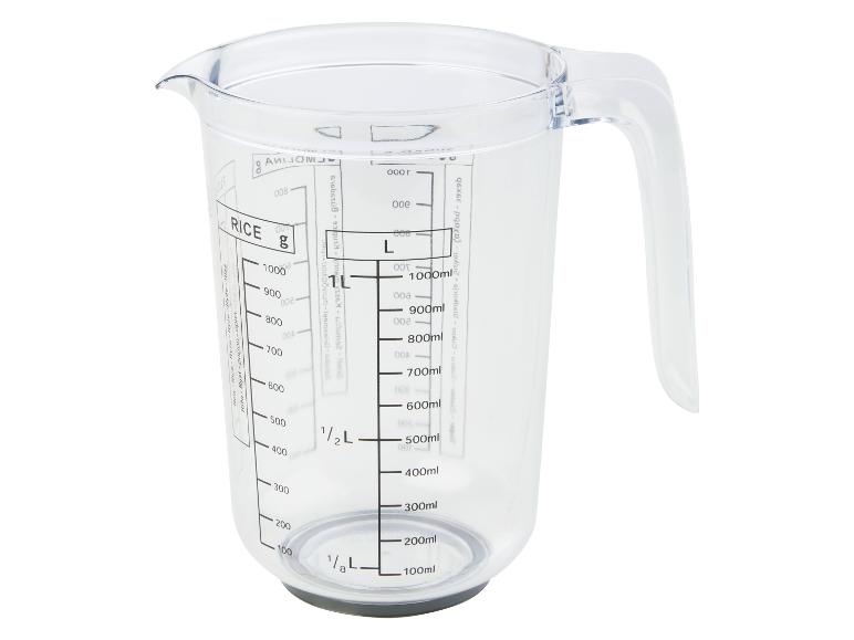 Průhledný odměrný hrnek s označením pro rýži a mililitry.