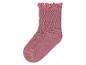 Růžová ponožka s žebrovanou strukturou a zvlněným okrajem.