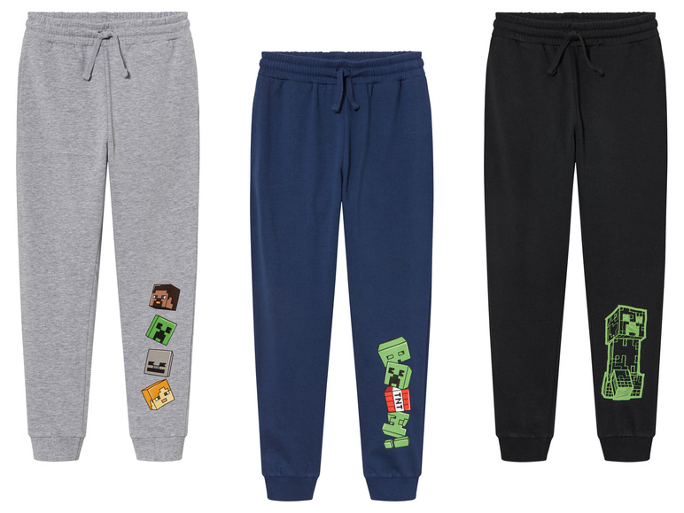 Tři teplákové kalhoty Minecraft v šedé, modré a černé barvě.