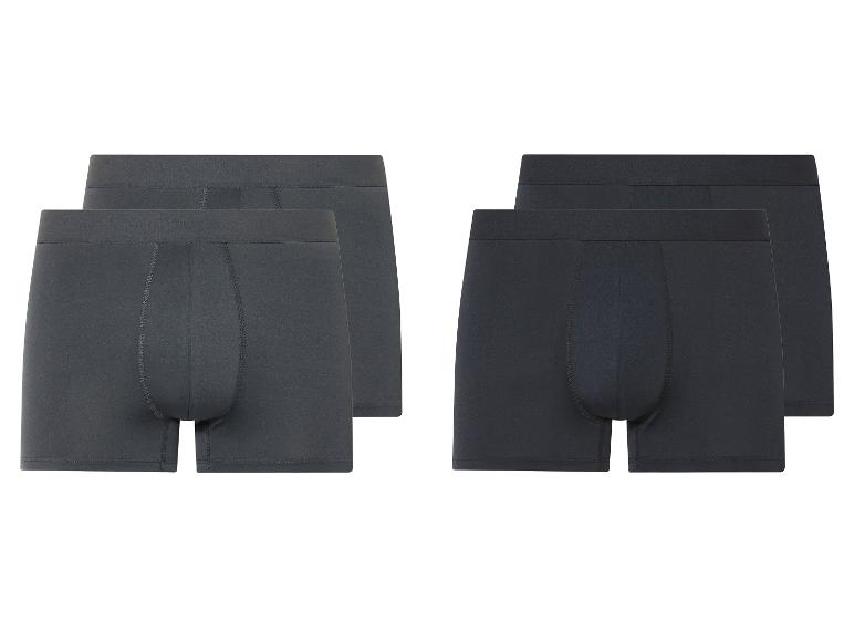Dvě tmavě šedé boxerky.