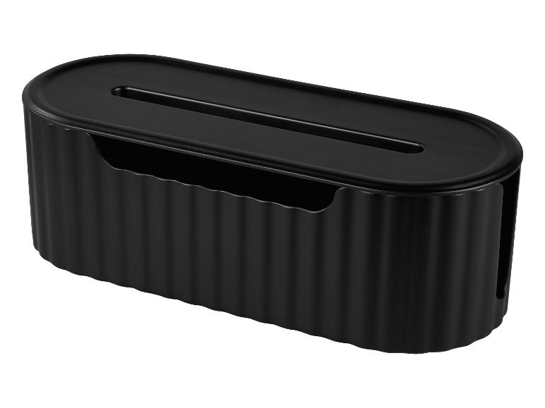 Černá oválná krabička na kabely s žebrovaným designem