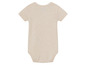 Béžový overal s krátkým rukávem pro miminka.