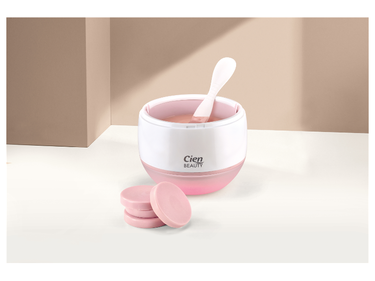 Cien Beauty ohřívač vosku s voskovými disky.