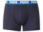 Modré Puma boxerky s bílým logem.