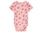 Růžové body s krátkým rukávem s potiskem červených květin.