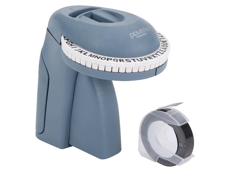 Optelec popisovací zařízení a černá popisovací páska.