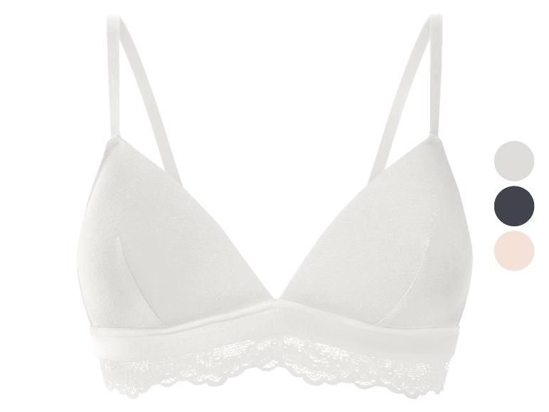 Bílá krajková bralette podprsenka s paletou barev vedle.