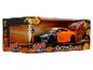 Figurky Naruto Shippuden a hračkářské auto 2009 Nissan GT-R (R35) v krabici.