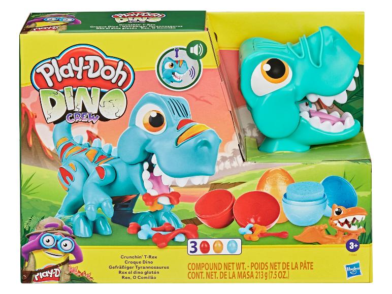 Hračka Play-Doh Dino Crew s T-Rexem, vejci a nástroji.