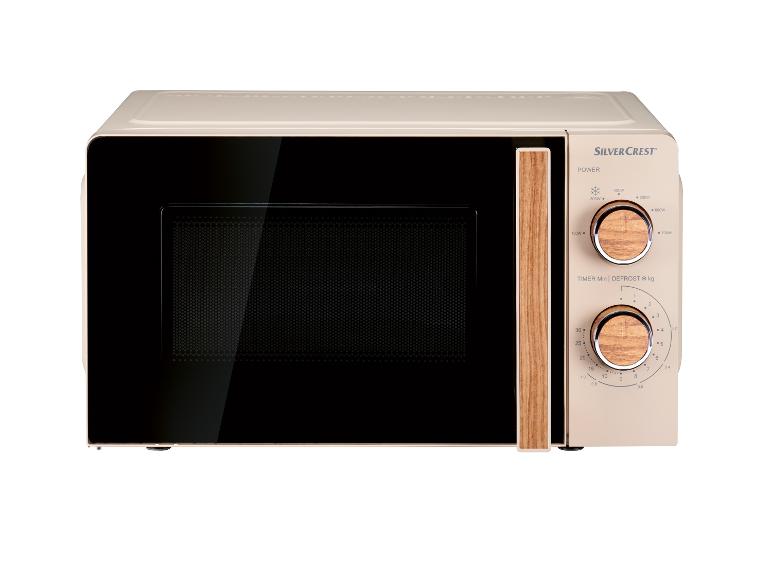Retro mikrovlnná trouba SilverCrest béžové barvy s otočnými knoflíky.