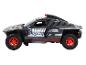 Model hračky černého rallyového auta Audi e-tron.