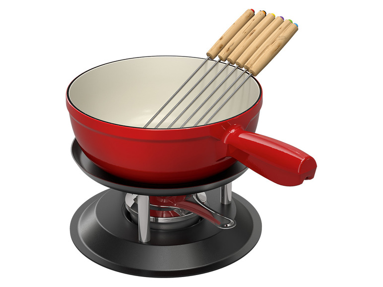 Červená fondue nádoba s fondue vidličkami.