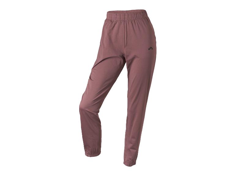 Hnědo-růžové sportovní kalhoty s elastickým pasem a manžetami.