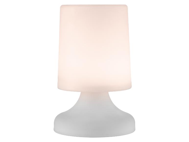 Bílá stolní lampa se svítícím válcovým stínítkem a zaoblenou základnou.