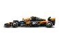 Závodní auto McLaren Formule 1 z kostek, s logy Chrome a Dropbox.