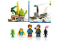 LEGO minifigurky a loď s názvem 'Tortuga's Dreamcraft Shop'.
