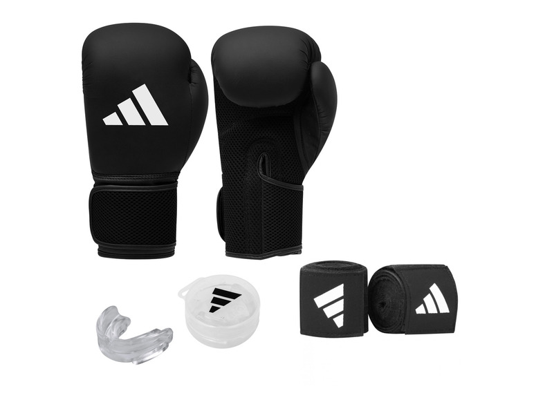 Černé boxerské rukavice Adidas, bandáže a chránič zubů.