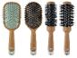 Čtyři kartáče na vlasy Cien Beauty s různými typy štětin.