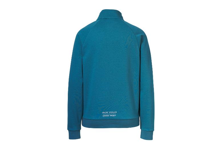 Tyrkysově modrá tréninková bunda s nápisem „RUN YOUR OWN WAY“ na zádech.