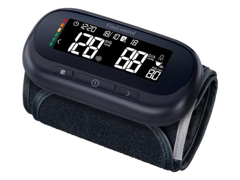 Digitální tlakoměr Vitalcontrol s manžetou, zobrazující 128/88 mmHg a puls 80.