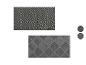 Dva koberce s geometrickými vzory v šedé a černé barvě.
