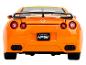 Oranžové hračkářské auto Nissan GT-R s křídlem