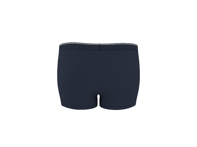 Tmavě modré boxerky s bílým elastickým pasem, zadní pohled.