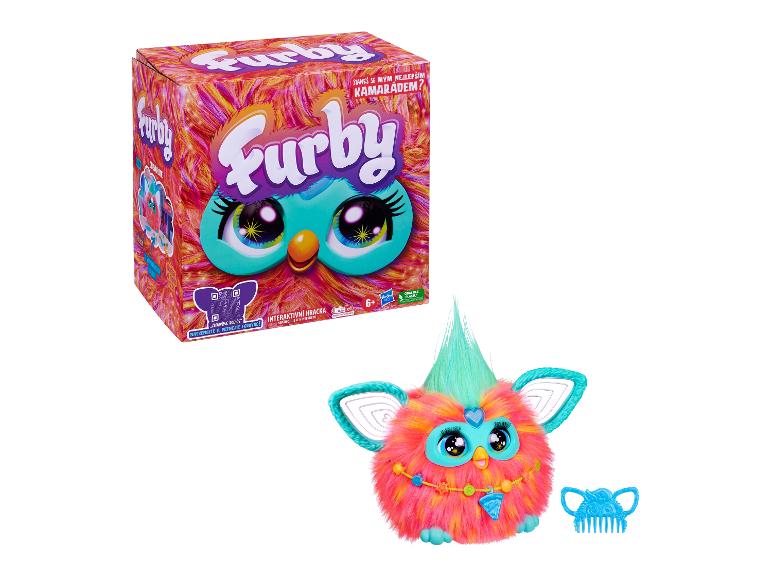 Interaktivní hračka Furby v balení i mimo něj, s hřebenem.