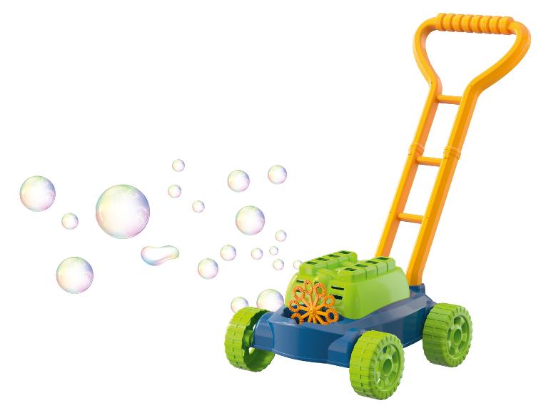 Dětský traktor na mýdlové bubliny, zelený a žlutý, fouká bubliny.