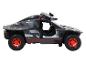 Černé Audi e-tron off-road auto s červenými koly.