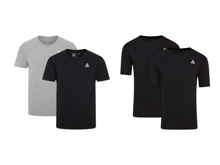 Trička Reebok v černé a šedé barvě, celkem čtyři kusy.