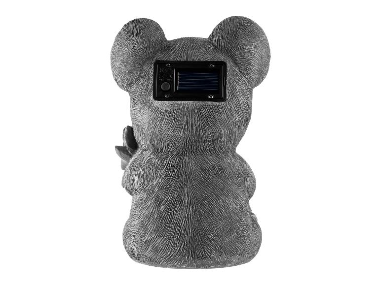 Zahradní solární svítidlo koala, zadní pohled se solárním panelem a vypínačem.