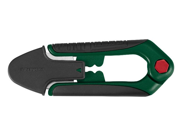 Zelený a černý univerzální nůž s výsuvnou čepelí a ergonomickou rukojetí.