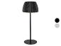 Černá plisovaná stolní lampa s kulatou základnou, zobrazena s barevnými možnostmi.