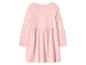 Dětské růžové šaty s dlouhým rukávem a červenými puntíky