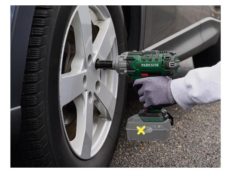 Mechanik používá akumulátorový rázový utahovák Parkside k výměně kola automobilu.